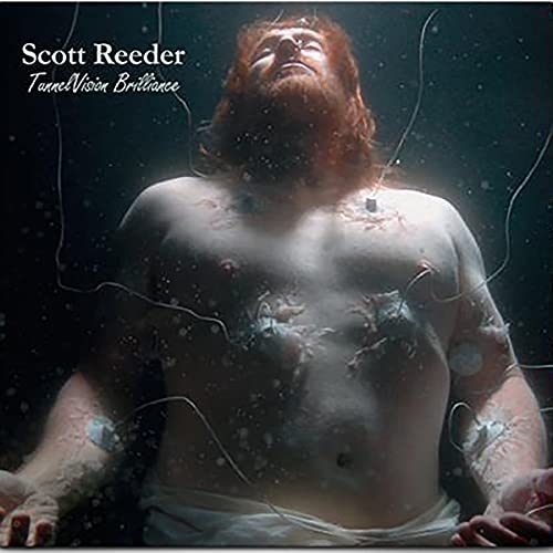 Album cover: shirtless man with medical sensors floating in dark water.