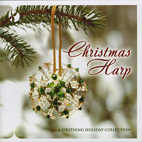 A beaded star-shaped Christmas ornament hangs from a pine branch on this album cover.
