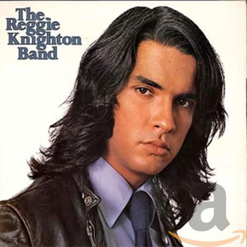 Album cover featuring a portrait of Reggie Knighton with long dark hair.