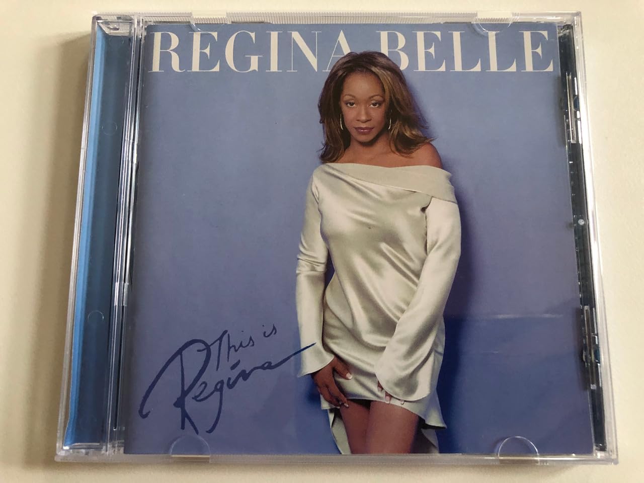 CD cover for Regina Belle’s “This Is Regina” with artist portrait.