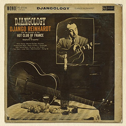 Vintage album cover featuring guitarist Django Reinhardt and still life.
