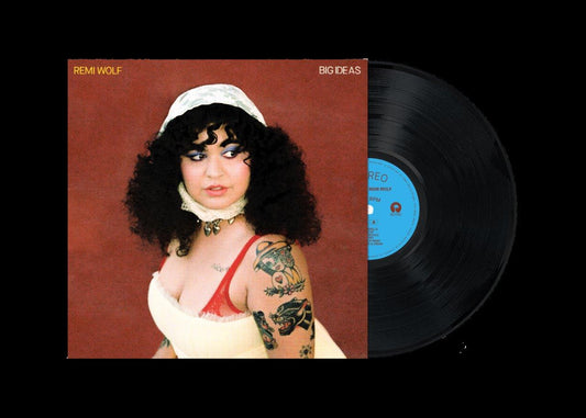 Remi Wolf's "Big Ideas" vinyl record with album cover portrait.