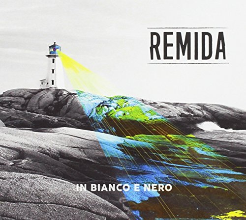 CD cover: lighthouse with bright beam over rocky coast, black and white.