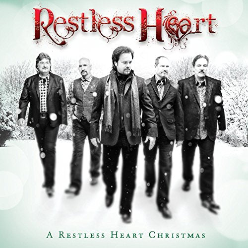 "Album cover featuring five men in suits walking in a snowy landscape."