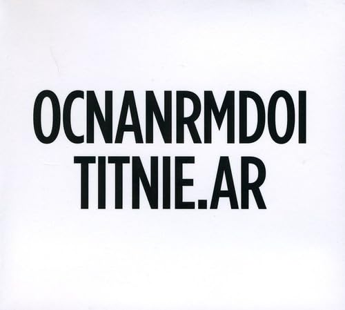White CD case with large, bold black text: "OCNANRMDOTITNIE.AR".