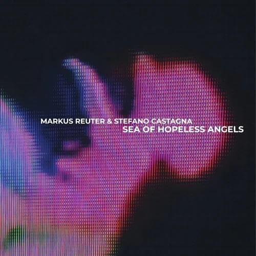 Album cover: distorted image of a hand and red, blue, pink hues.