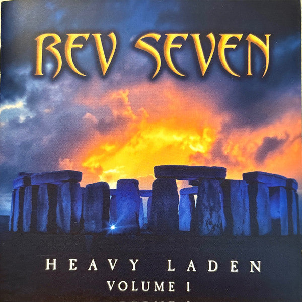 CD cover for Rev Seven’s “Heavy Laden Volume 1” with stonehenge imagery.