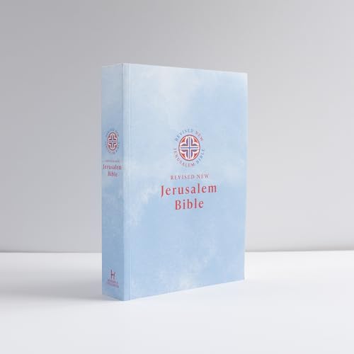 Light blue Bible with red and gold text, standing upright.