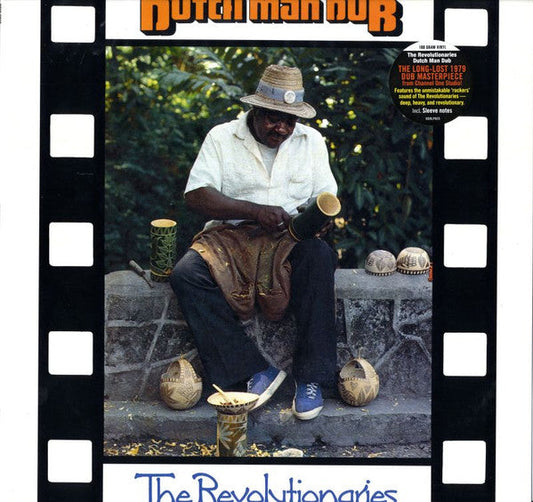 Album cover: man with instruments, framed like filmstrip, text above and below.