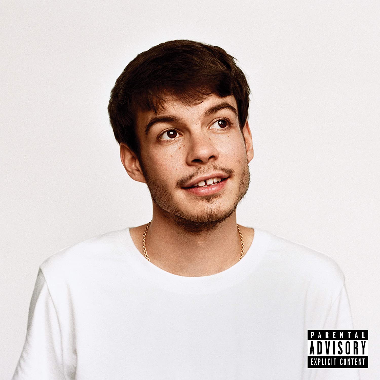 "Album cover featuring a man in a white shirt with a parental advisory label."