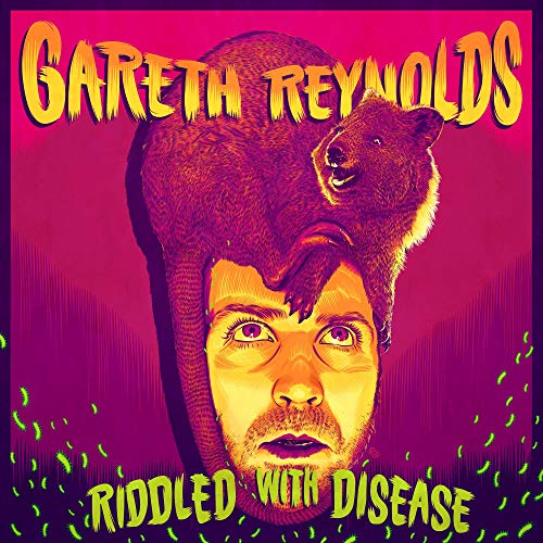 Vinyl album cover with a man's face and a rat on his head.