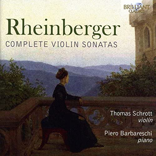 CD cover: woman in dark dress overlooking misty mountains.