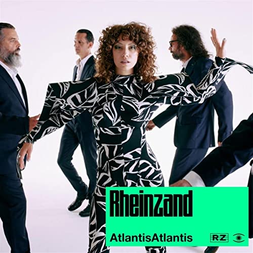 Rheinzand band members in suits pose dynamically against a white background.