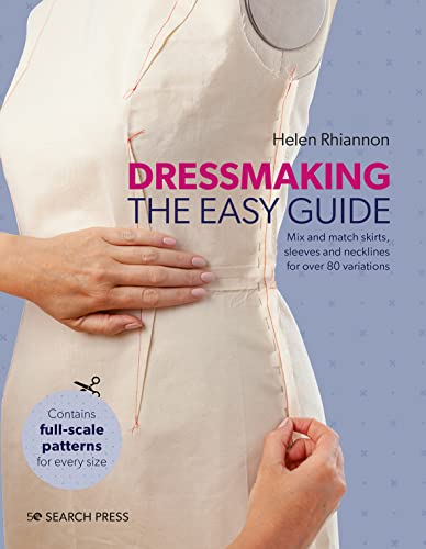 Book cover showing hands pinning a white fabric dress form against a blue background.