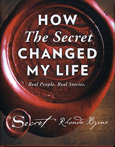 Book cover: "How The Secret Changed My Life" with a red wax seal.