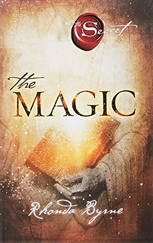 The book cover for The Magic by Rhonda Byrne features a glowing book held.