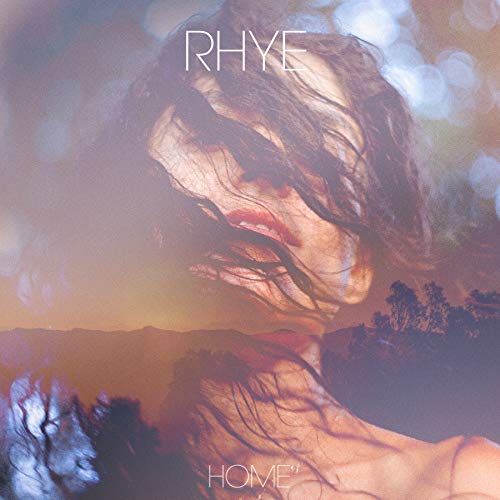 Rhye's "Home" vinyl cover: blurred portrait with orange and blue tones.