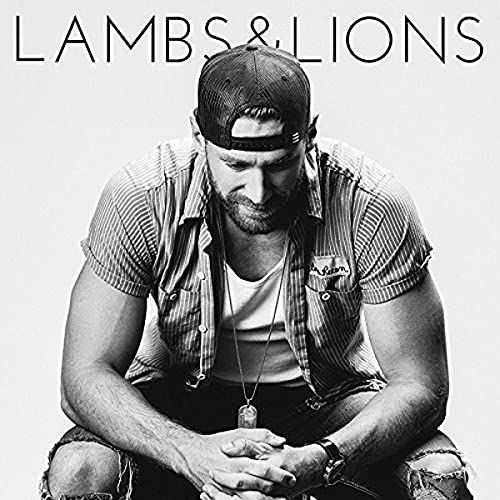 Black and white CD cover featuring a man in a hat looking down.