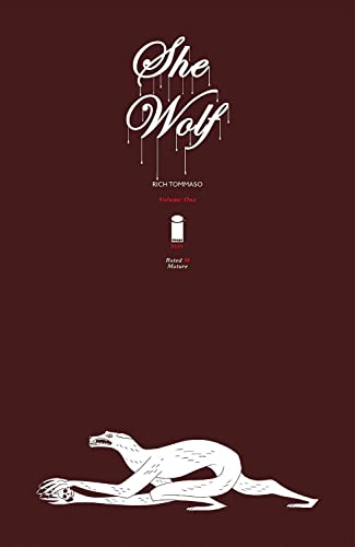The She Wolf volume one book cover features a white wolf on maroon background.