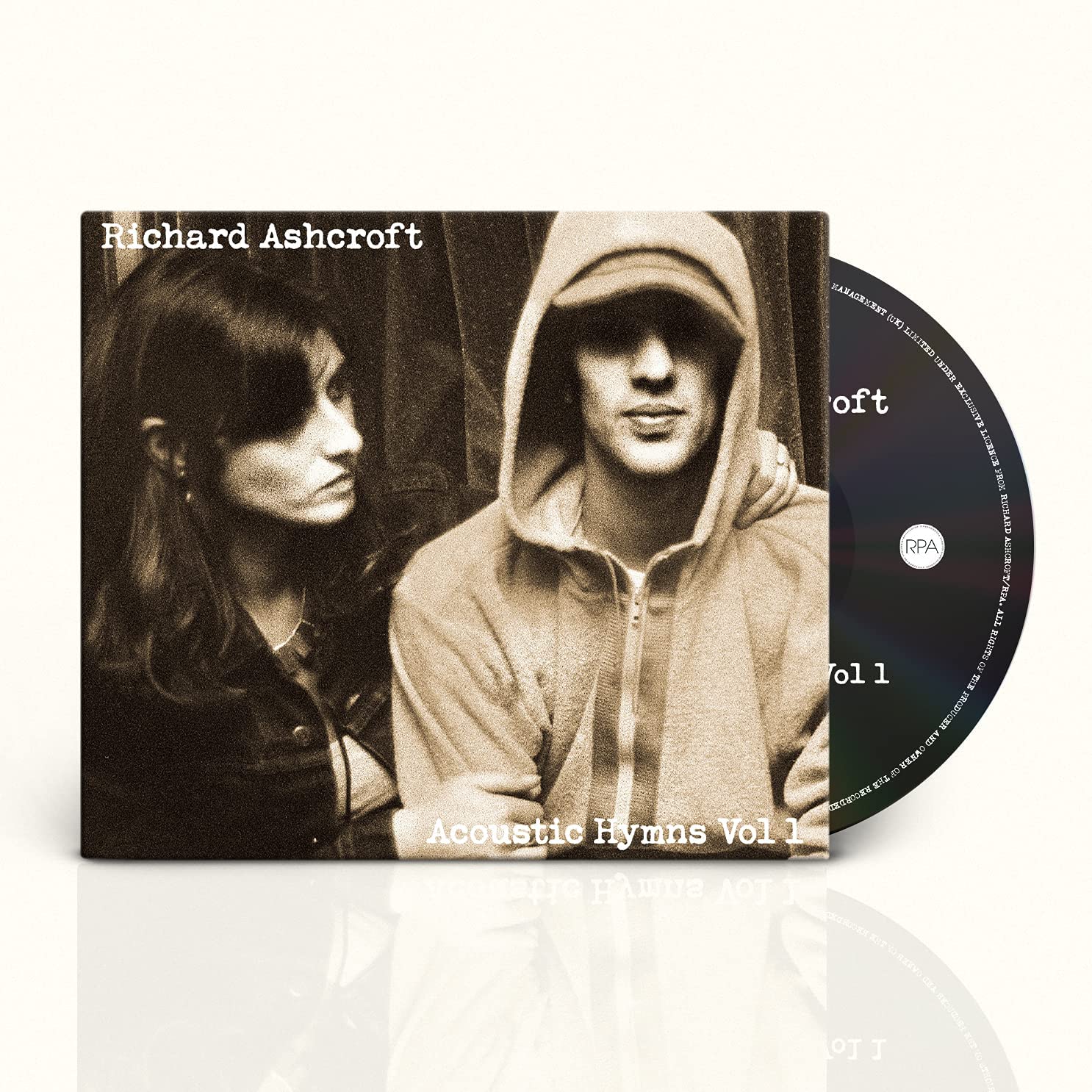 Richard Ashcroft album cover: two faces in sepia tones, “Acoustic Hymns Vol 1.”