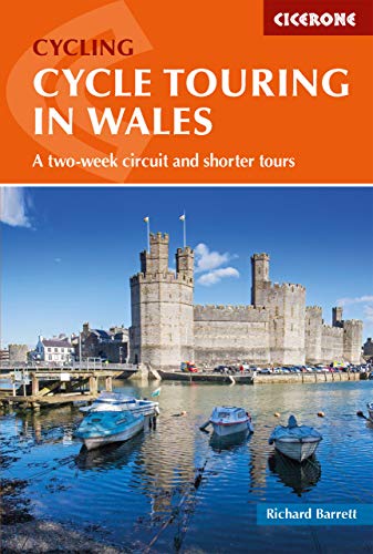 Book cover: "Cycle Touring in Wales" with a castle and boats image.
