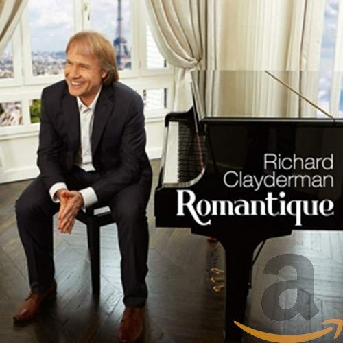 Richard Clayderman sits beside a grand piano with the Eiffel Tower visible.