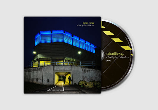 Richard Hawley CD cover: nighttime city scene with a lone figure.