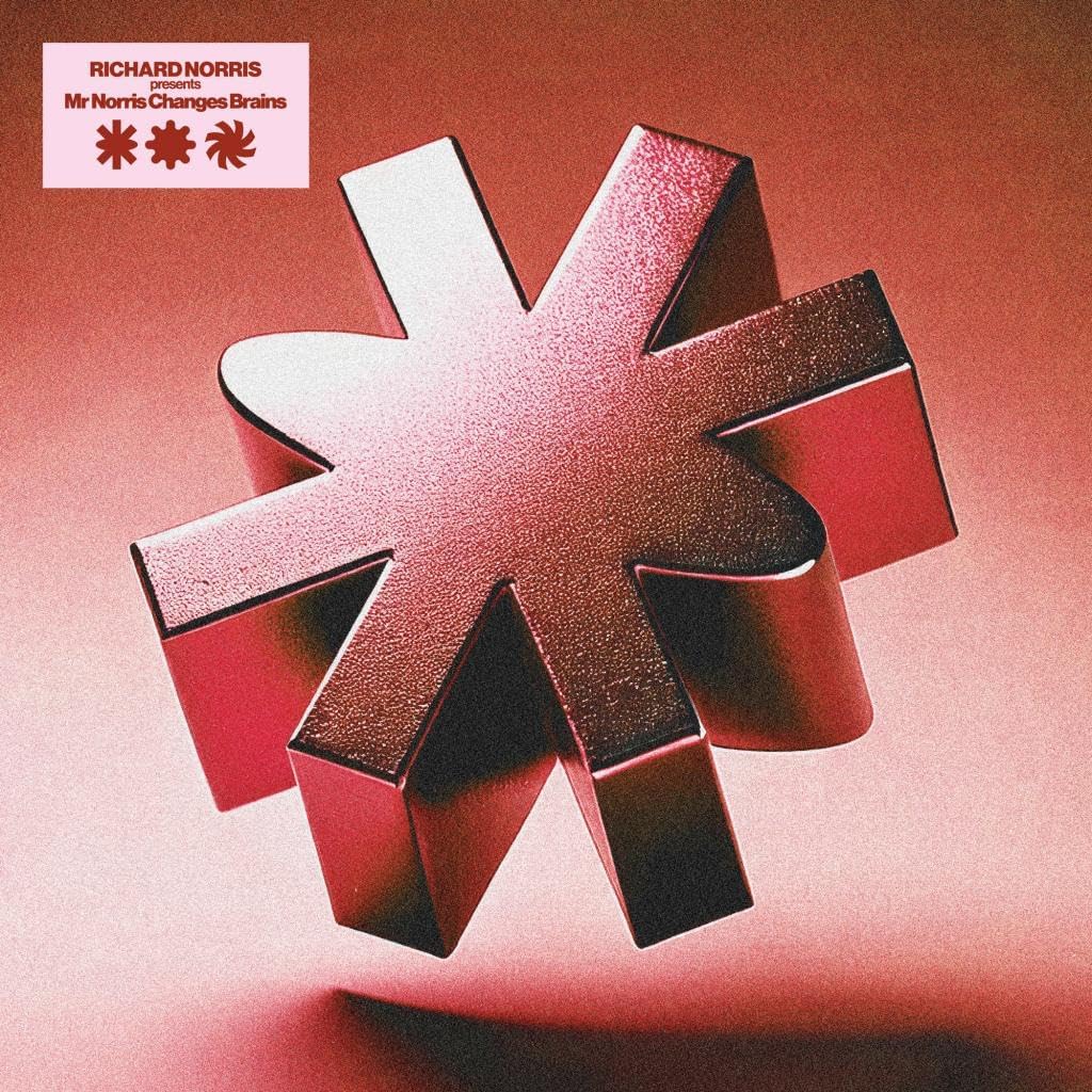 Red abstract geometric design on album cover for Richard Norris’ “Mr Norris Changes Brains.”