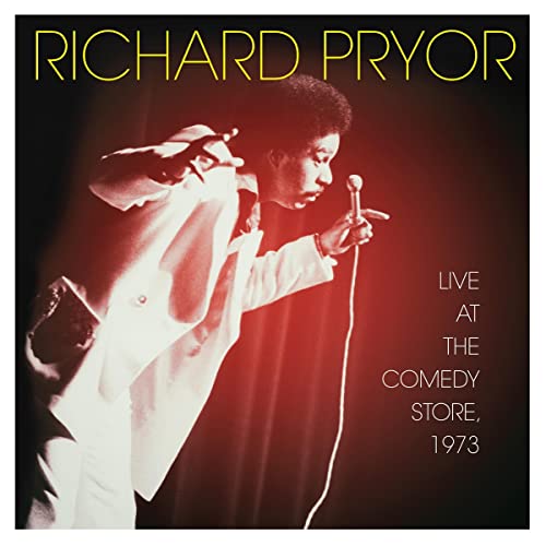 Richard Pryor performing stand-up comedy with a microphone, vinyl record cover.