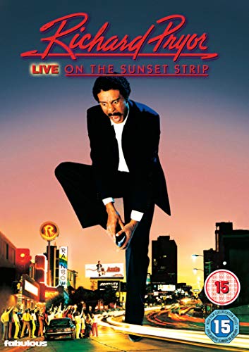 Richard Pryor in a suit jumping over a Sunset Strip street scene at sunset.
