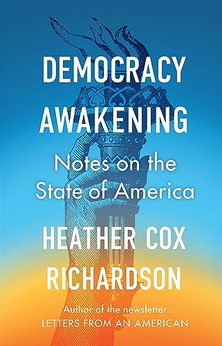 Book cover: “Democracy Awakening” with a hand holding a Statue of Liberty torch.