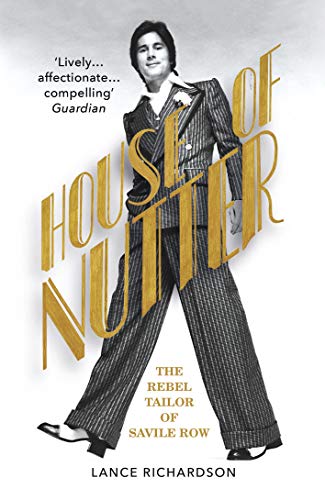Book cover featuring a man in a pinstripe suit walking confidently.