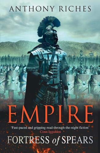 Book cover showing a Roman soldier in armor standing before an army and fort.