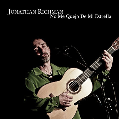 Album cover with Jonathan Richman playing guitar, wearing green, against a black background.