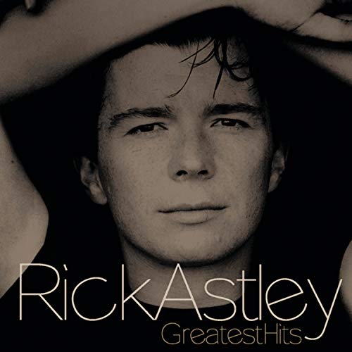 Rick Astley’s “Greatest Hits” CD cover featuring a portrait of the singer.