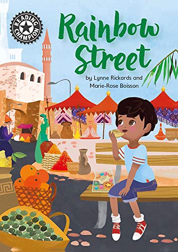 Book cover: boy eating at a colorful outdoor market scene.