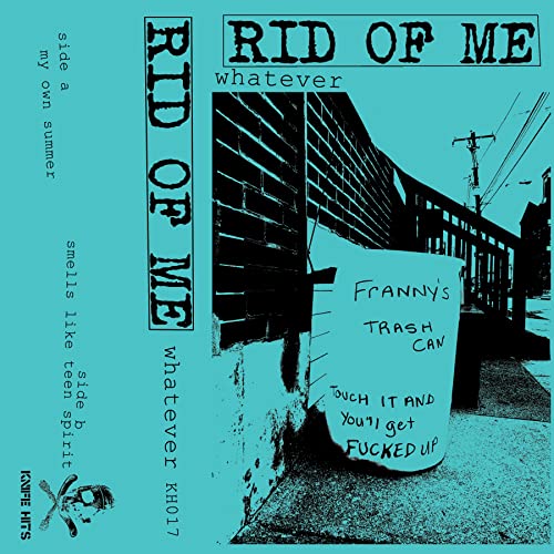 Blue cassette tape for "Rid Of Me - Whatever" with a brick wall image.