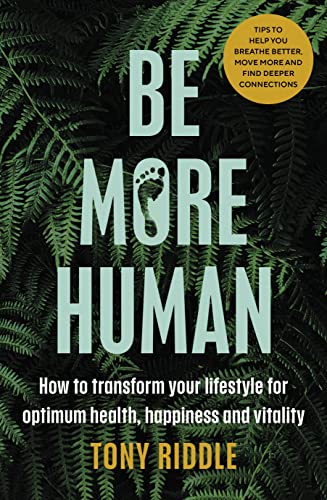Book cover with large white text "BE MORE HUMAN" and a foot in a leaf.