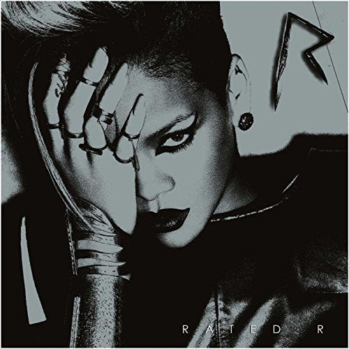Rihanna's "Rated R" album cover, a stark black and white portrait.