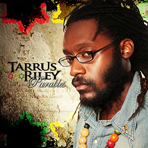 Tarrus Riley album cover, portrait of a man with dreadlocks and glasses.