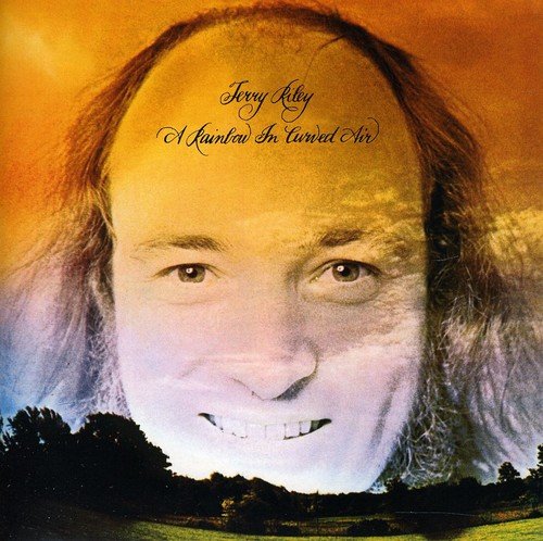 "Terry Riley's album cover featuring a man's face over a landscape."