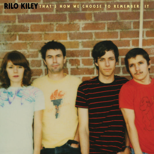 Rilo Kiley album cover featuring four people against a brick wall.