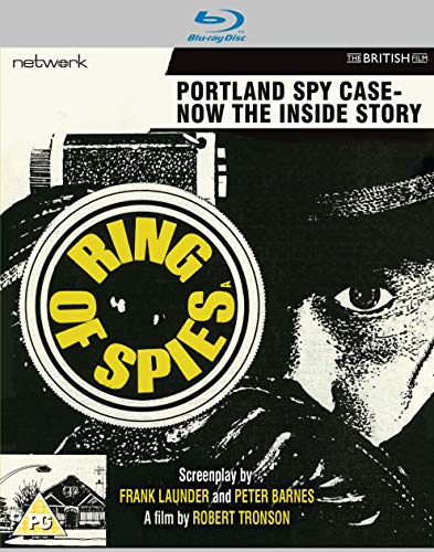 Black and white film poster with yellow text on a magnifying glass and a man's face.
