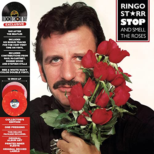 Ringo Starr album cover featuring him with red roses, colorful vinyl shown.