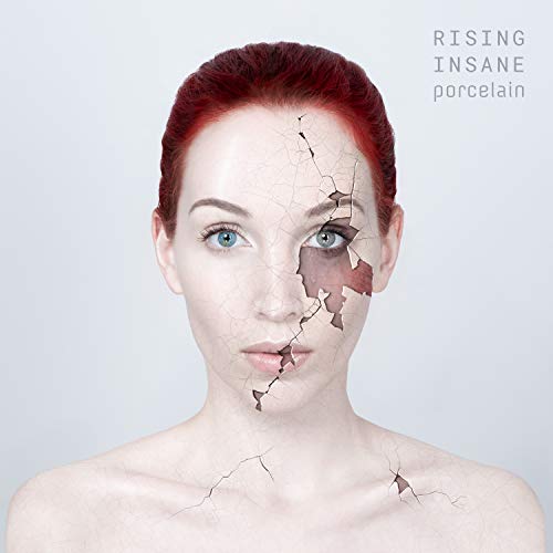 Woman with cracked porcelain skin and red hair, album cover.