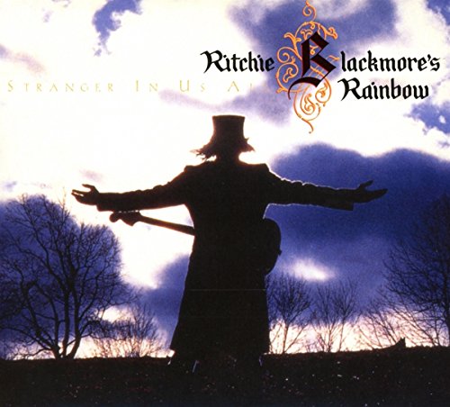 Rainbow album cover: silhouetted figure with outstretched arms against a cloudy sky.