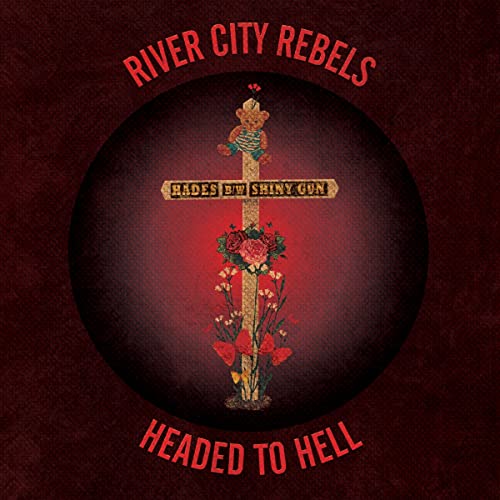 Record album cover: crucifix with teddy bear, roses, and text.
