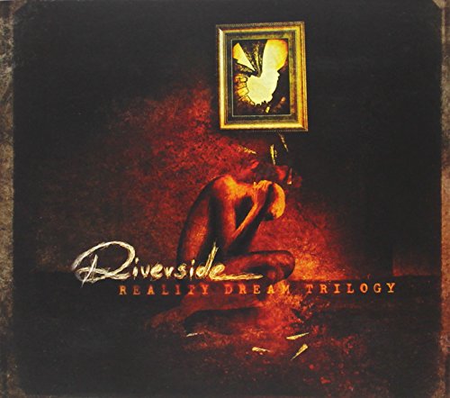 Album cover showing a crouching figure beneath a framed picture against a dark background.