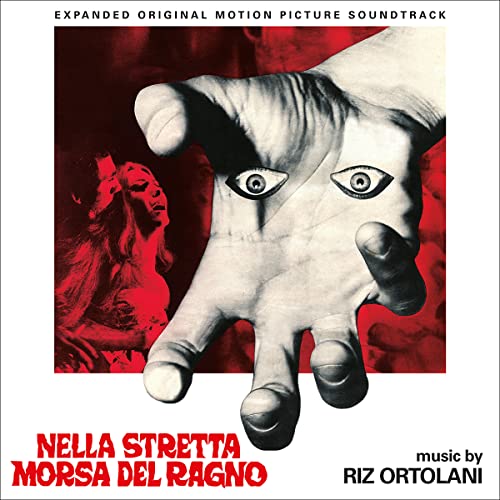 CD cover: large hand with eyes, a woman, and red background.