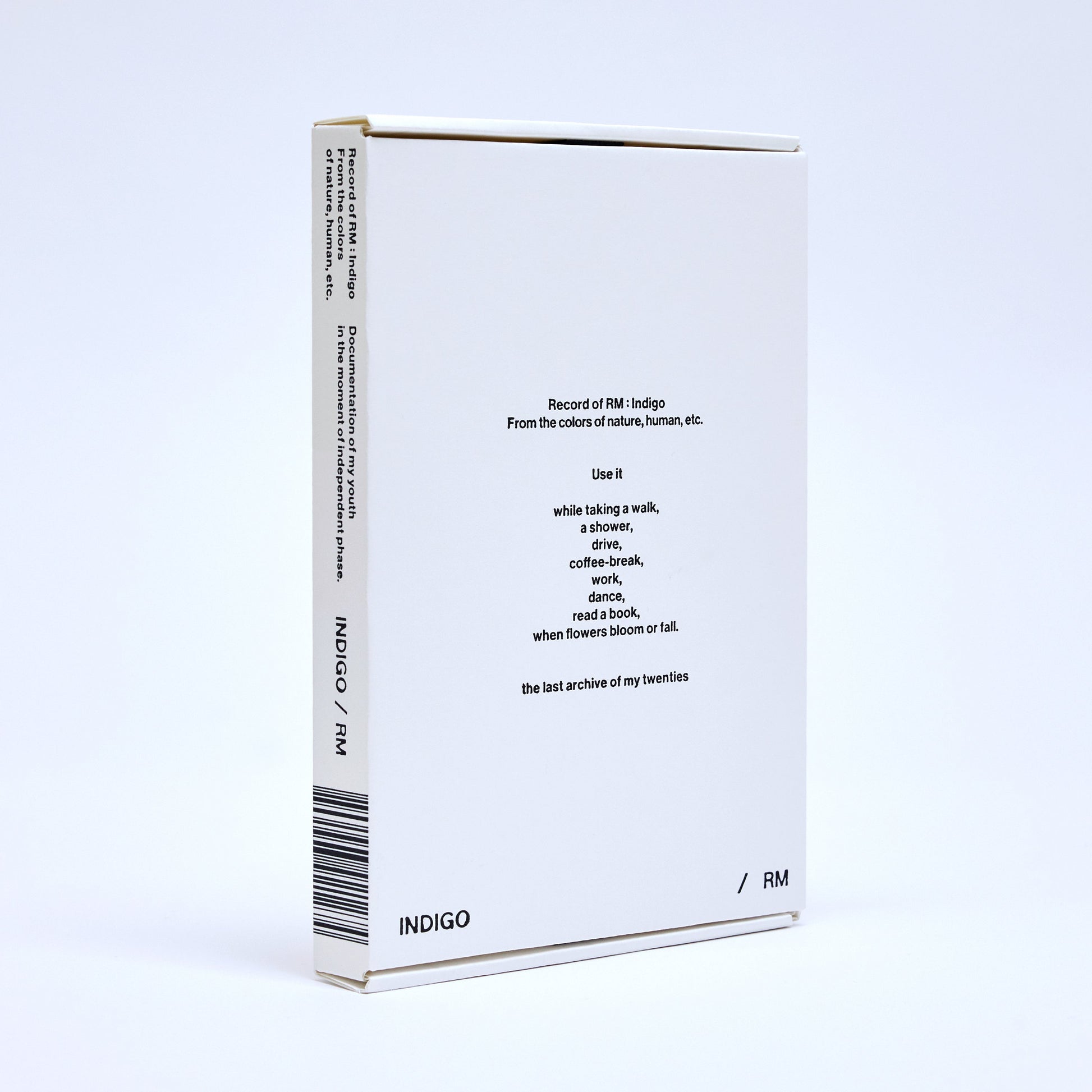 White book edition of RM’s “Indigo” with barcode and text details.